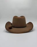 Back view of a brown cowboy hat with a braided band on a white background