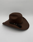 Detail of upcycled hat band on dark brown suede cowboy hat by Gem Hats